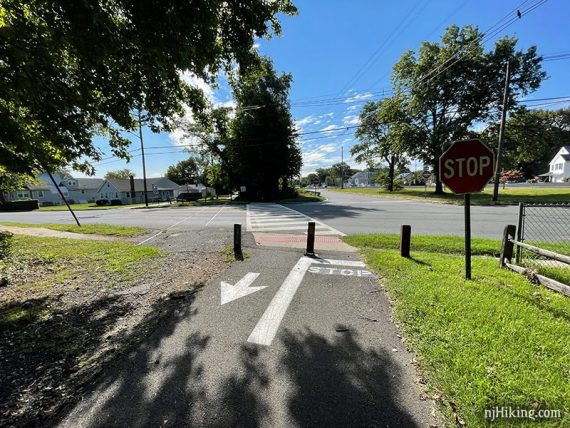 Henry Hudson street crossing with stop sign.