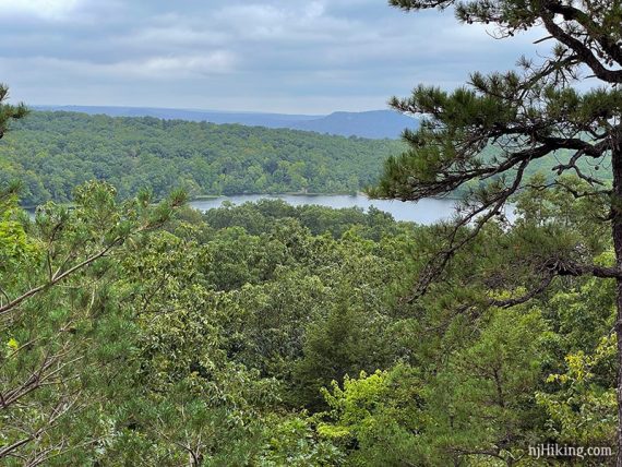 Ramapo Lake seen beyond green trees