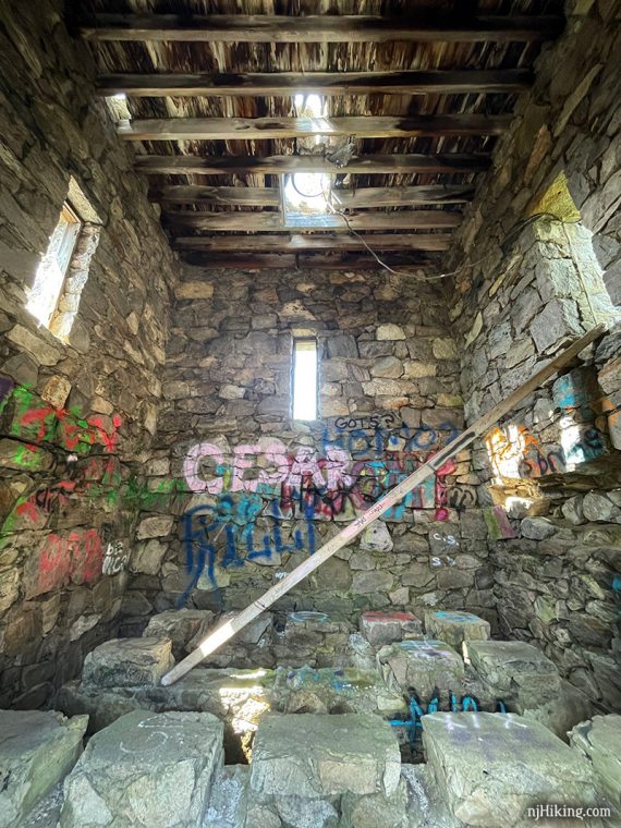 Interior of a stone tower that once held a water cistern