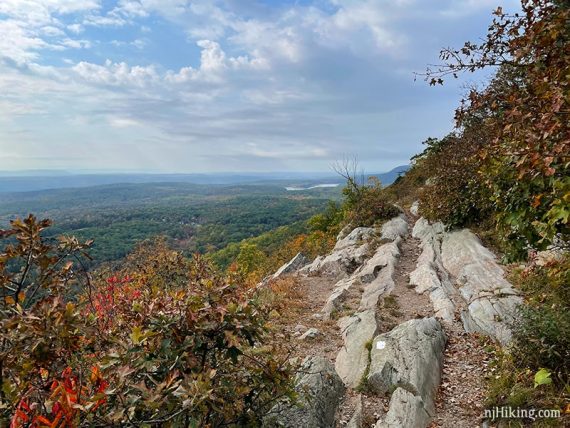 Exposed ridged rocky outcrop with a view over the valley below