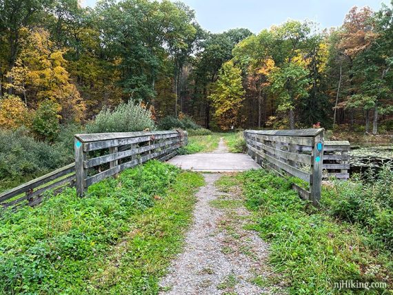 Wooden bridge over a spillway