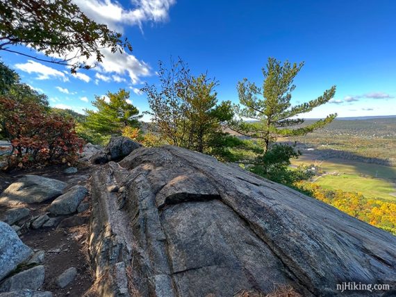 Long rock outcrop with a valley below.