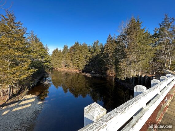 Cedar Creek seen from a white wooden bridge.