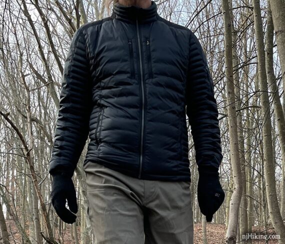 Hiker wearing a puffy jacket.