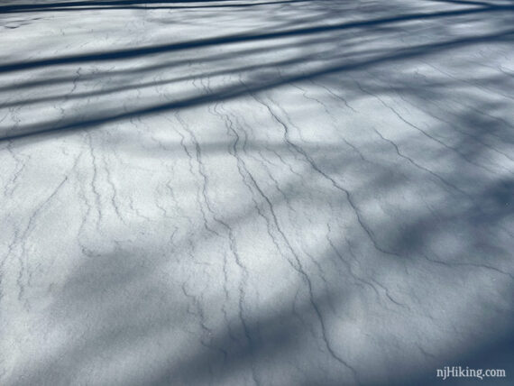 Snowy field looks like marble