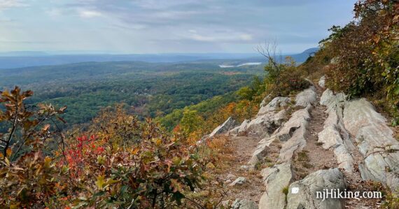 View over a colorful valley from a rocky ridge