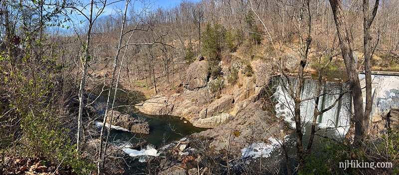 Water cascading over a dam and into the gorge below