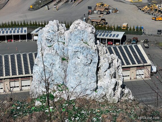 Chimney Rock close up with a quarry behind it