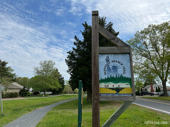 Barnegat Branch Sign next to a gravel trail.