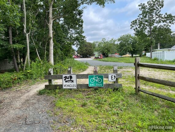 End of Barnegat Branch Trail sign on a fence.