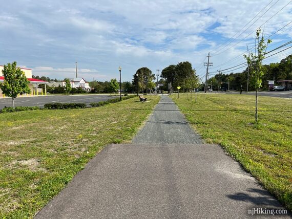 Gravel trail adjacent to road.