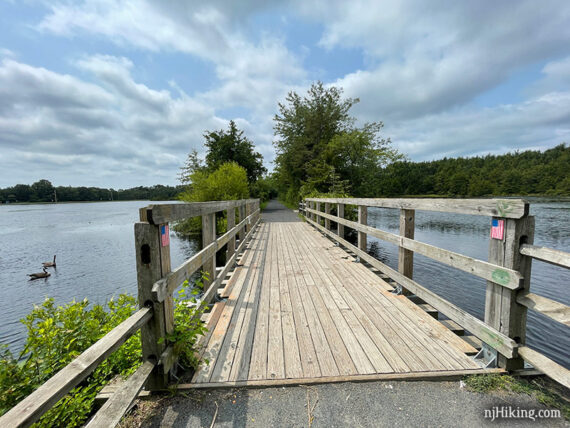 Large wooden trail bridge over the North Branch of the Forked River.