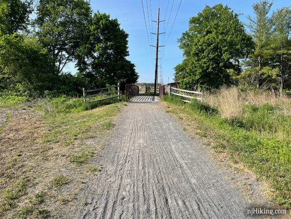 Bridge on a crushed stone rail trail.