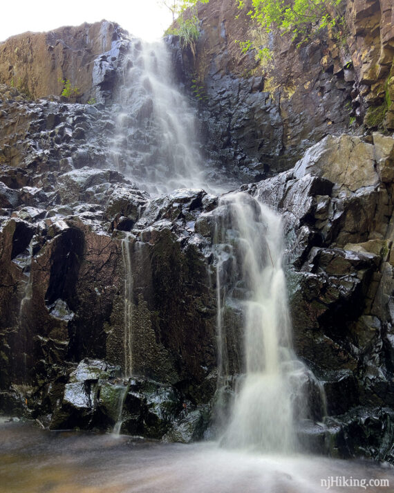 Close up of water cascading over a cliff.
