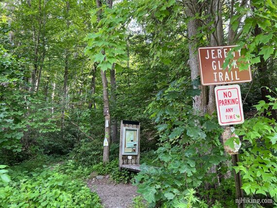 Sign for Jeremy Glick Trail and a wooden trail kiosk for Bearfort Ridge