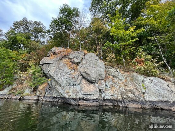 Tall cliff along a reservoir.