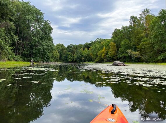 Kayak in the channel between an island and the shore.