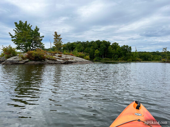 Small rocky island seen from a kayak.