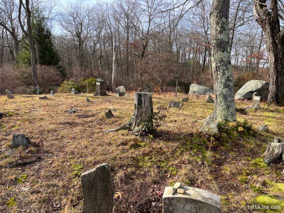 Old grave stones set on a hill.