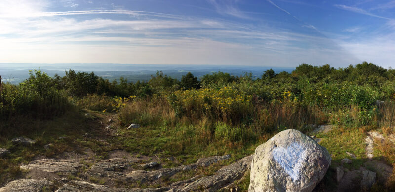Panorama from Sunrise Mountain with a white heart painted on a rock.