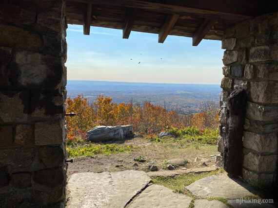 Looking out from inside an stone pavilion.