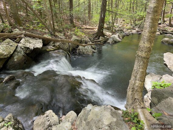 Looking down on a waterfall on a brook.