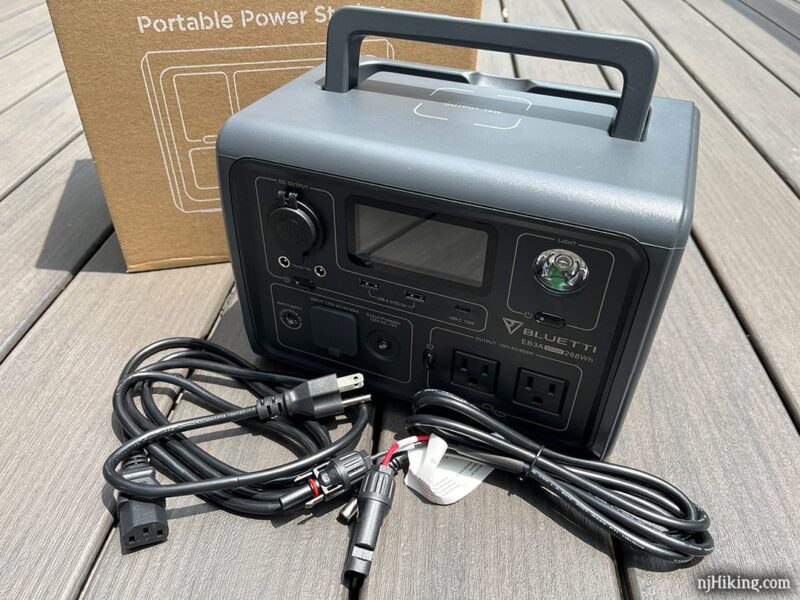 BLUETTI Portable Power Station EB3A, cords, and box.