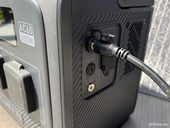 Solar charging cord and port on the side of the AC60.