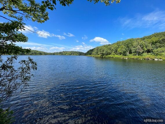 Sunfish Pond with a bright blue sky and water.