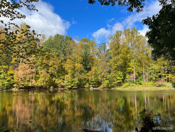 The Black River with colorful leaves on the trees along it.