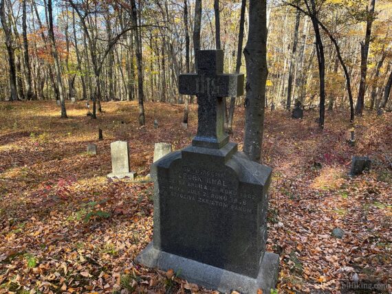 Head stone with a cross.