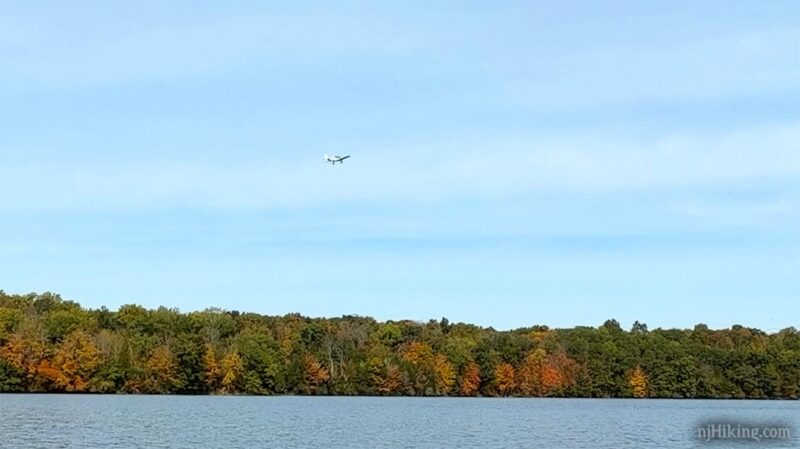 Plane flying over Lake Aeroflex.
